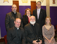The founder and chief executive officer of Homeboy Industries, Rev. Gregory Boyle, S.J., received the Pedro Arrupe, S.J., Award for Distinguished Contributions to Ignatian Mission and Ministries at The University of Scranton on April 7. At the ceremony are, seated from left, Rev. Scott R. Pilarz, S.J., president of The University of Scranton; Father Boyle; and Julia White ‘10, president of the JUSTICE club. Standing are Rev. Richard Malloy, S.J., vice president for university ministries; Patricia Vaccaro, director of community outreach; and Harry Dammer, Ph.D., professor and chair of the Sociology/Criminal Justice Department.
